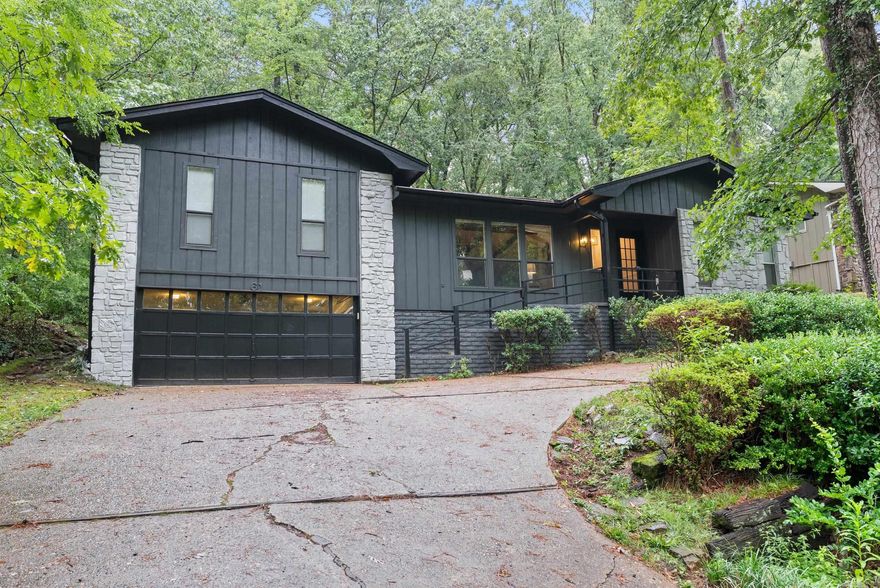 Step into this beautifully updated 3-bedroom, 2.5-bathroom home and you will instantly know you have found "the one!" Inside, you’ll find a fully renovated interior featuring a sleek modern kitchen, updated bathrooms, new flooring, stunning light fixtures, and fresh paint throughout. Vaulted ceilings and a beautiful wood-burning fireplace anchor the living room, creating a cozy, yet sophisticated atmosphere. Off the back of the home, the sunroom provides gorgeous natural light and will have you ready to relax and unwind. The tranquil backyard is a true retreat, complete with a charming bridge and peaceful winter views of the DeSoto Golf Course. Exterior upgrades—including a newer roof, HVAC system, and french drains—ensure lasting comfort and peace of mind. Whether you’re entertaining or unwinding, this home offers the perfect balance of modern updates and natural beauty in one of Arkansas’s most desirable communities! Schedule your showing today!!