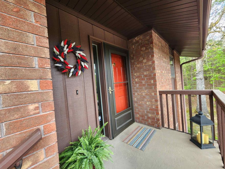 Enjoy the tranquility and privacy of this lovely upstairs corner unit condo, nestled in a wooded setting near Lake Hamilton. This 2-bed 2-bath home features a spacious, open layout, with many new updates throughout. Relax by the gas fireplace during the winter and the gated pool during the summer. Unwind on the deck and enjoy nature's beauty that surrounds you. With its peaceful, wooded surroundings, close proximity to Lake Hamilton, shopping, and the horse races, this condo is an ideal retreat for those seeking privacy and quick access to local attractions. Hot water tank, washer/dryer, appliances, storm door all new in 2021. New roof and garbage disposal in 2023. Freshly painted in 2025. POA has 7 days first right of refusal.