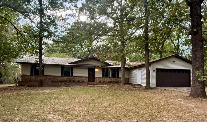 THIS PRICE WILL MOVE YOU! This recently updated 3-bedroom, 2-bath home in the well-established Clearview sub-division is WELL WORTH the CALL. Family room highlighted by a built-in bookcase, fresh paint, new flooring and a fireplace. RECIPE FOR SUCCESS in your step-saver kitchen with updated counter tops, a new sink, stove and freshly painted cabinets. Need more LIVING SPACE? Additional den is the perfect spot for a game room, playroom, or additional living room. Bedrooms are situated near one another with good closet space and size. HAVE A GREEN THUMB? Located on a 1-acre lot, the fenced backyard and detached storage building offer plenty of space for a garden and tools. Call today, and LET'S TALK DETAILS!