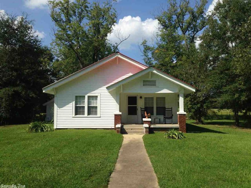 2 bedroom 1 bath home outside city limits with metal roof.