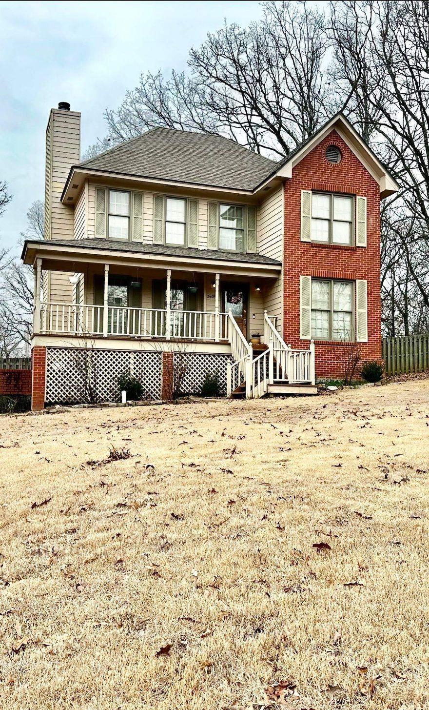 The victorian style home sits on its rolling lot.  This home has a formal dining room for family get togethers and the living room has a fireplace for those cozy winter nights.  The kitchen has butcher block countertops with white cabinets and small island.  Master bedroom has tray ceilings and a small sitting area.  Master bath has a walk-in shower and jet tub.  There are two additional bedrooms, a full bath and a half bath.  Backyard has a wood privacy fence and a screened in patio.