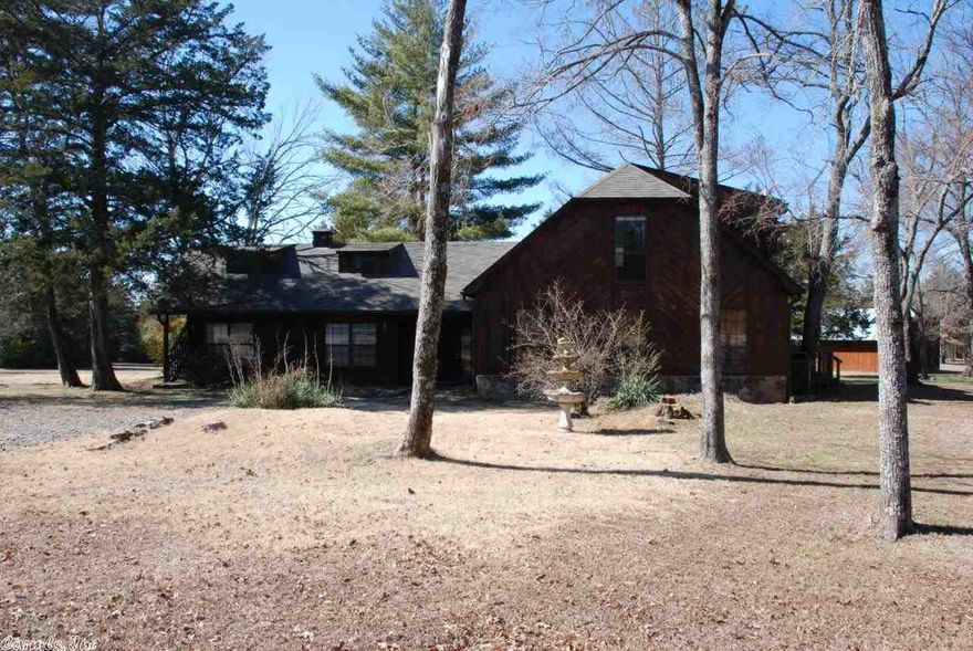 Amazing homestead in town. Just under 5 acres, this lovely home is well-maintained and in the middle of an expansive yard with horse corral and a large workshop. In-ground pool with privacy fence. Vaulted ceilings, big windows, upstairs bonus room with a separate entrance would be perfect for grown kids, in-laws, guests or just a craft room or home office. Lots of possibilities.  This is a DREAM PLACE for someone who wants country living amenities with convenient access to town. Quiet, quality neighborhood!