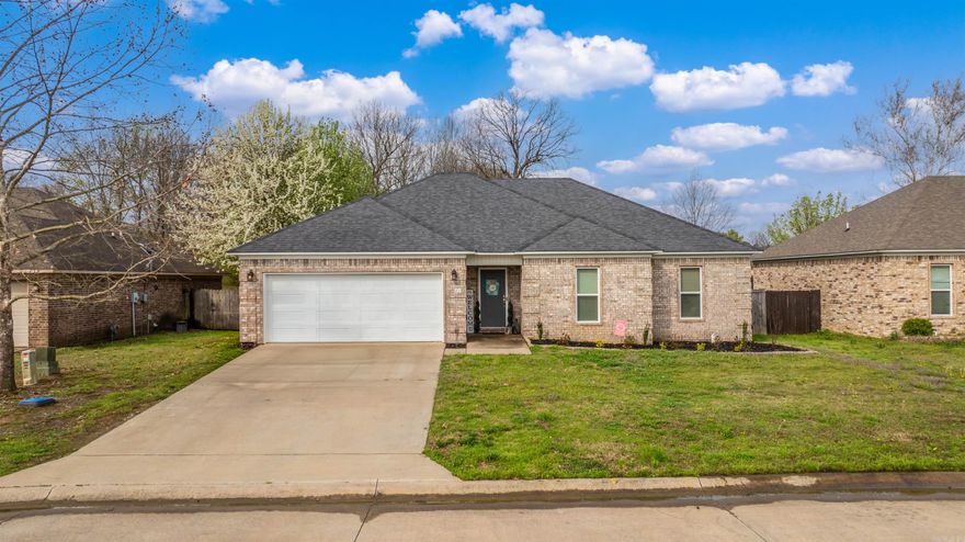 Adorable home in the Vilonia School District! This move-in ready cutie features sealed concrete floors throughout and stylish brushed nickel finishes. The open floor plan and split bedroom layout offer both comfort and privacy. The spacious primary suite includes a large walk-in closet, while the kitchen shines with granite countertops and stainless steel appliances.  The great room is a true focal point with a beautiful electric wall fireplace, complete with a mantle and dramatic feature wall that extends all the way to the ceiling. Step outside to enjoy the fully fenced, level backyard — perfect for pets, play, or relaxing evenings.  You won’t want to miss this one!