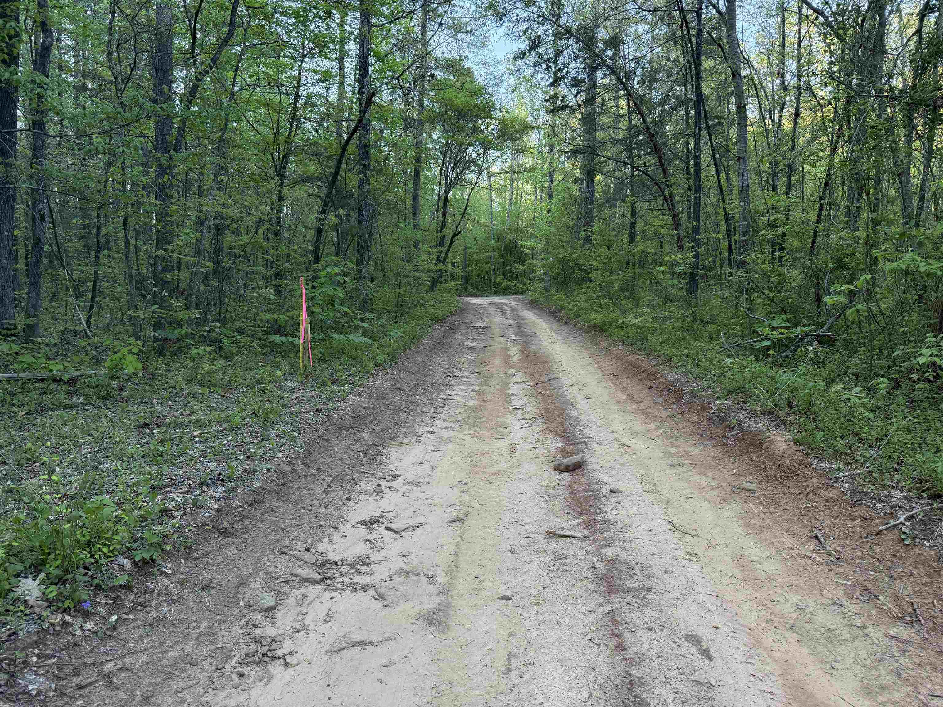 Discover 9.8+/- off-grid acres in Van Buren County, Arkansas, with Pee Dee Creek flowing through the property and a scenic cabin site ready for your dream getaway. This secluded tract features dramatic bluffs, natural springs, and cave overhangsāperfect for outdoor enthusiasts, homesteaders, or anyone seeking peace and privacy in the Ozarks. Whether you're looking for a quiet retreat or a basecamp for exploration, this land offers a rare mix of water, elevation, and raw natural beauty. Don't miss this opportunity to own your slice of Arkansas wilderness.