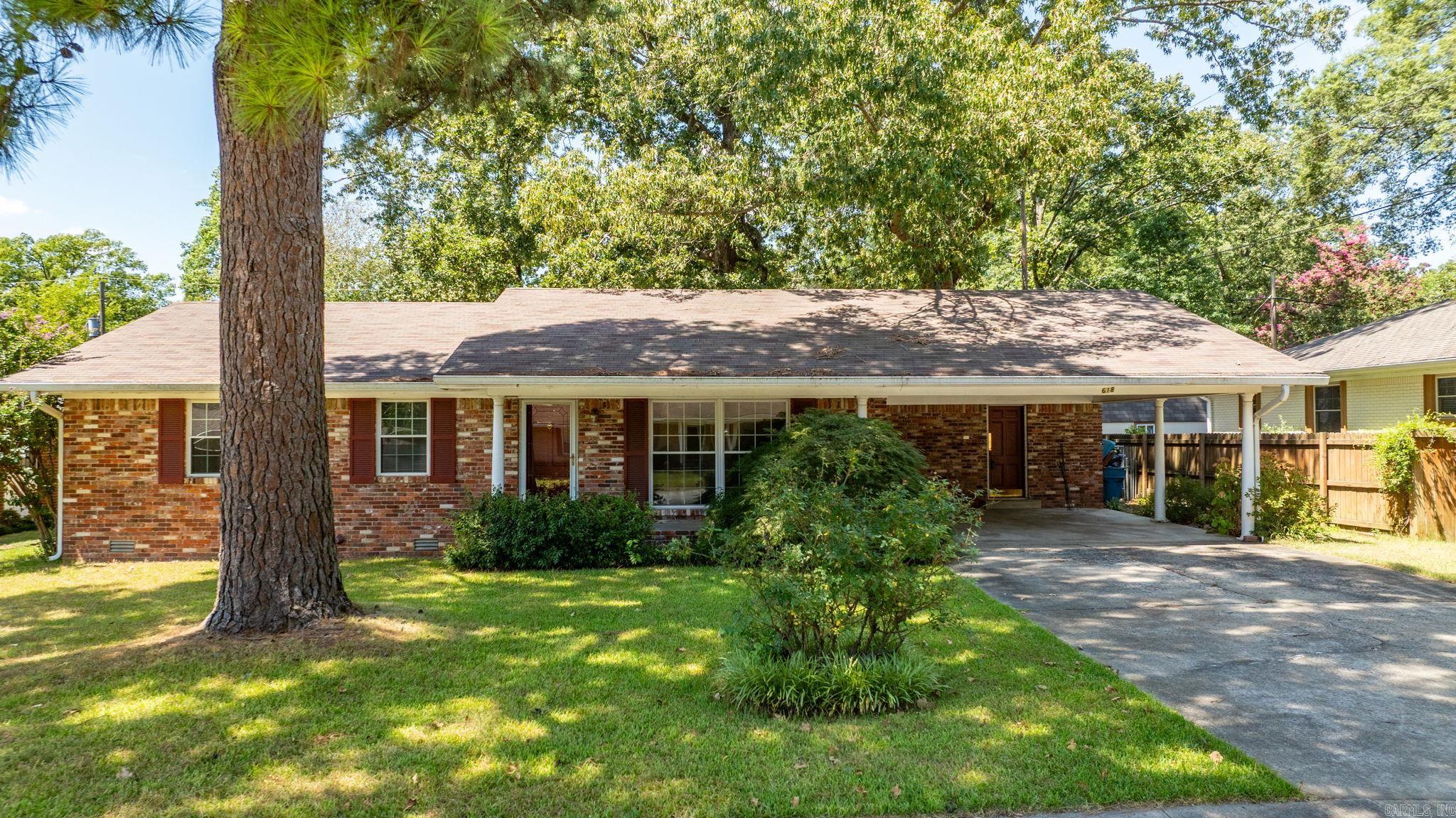 Fabulous mid-town location in the Heart of Little Rock! Handsome brick one level with exceptional floor plan. Spacious family living and dining that flows into kitchen area, nice sized rooms throughout. Large primary suite with two guest bedrooms and additional tile bath. Beautiful hardwood floors. Fantastic large back yard perfect for cookouts and outdoor entertaining. Covered parking. A must see!