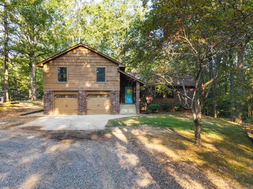 Welcome home to this beautifully updated retreat on 3 wooded acres with a creek and in-ground pool—your own private oasis in the heart of nature. This spacious 2,850 sq ft home includes a 700 sq ft finished walk-out basement, perfect for a game room, guest space, or additional living area. Step inside and fall in love with the stunning modern kitchen, complete with sleek quartz countertops, new cabinetry, and a picture-perfect view out the black-trimmed windows. You’ll enjoy multiple gathering spaces including a formal dining room, formal living room, and a dedicated office—ideal for working from home or hosting the holidays. Outside, let the sounds of the creek or the poolside breeze set your pace. Whether you’re chasing fireflies or sipping sweet tea on the porch, this property feels like home the second you pull up. PROPERTY IS RURAL DEVOLOPMENT ELIGIBLE