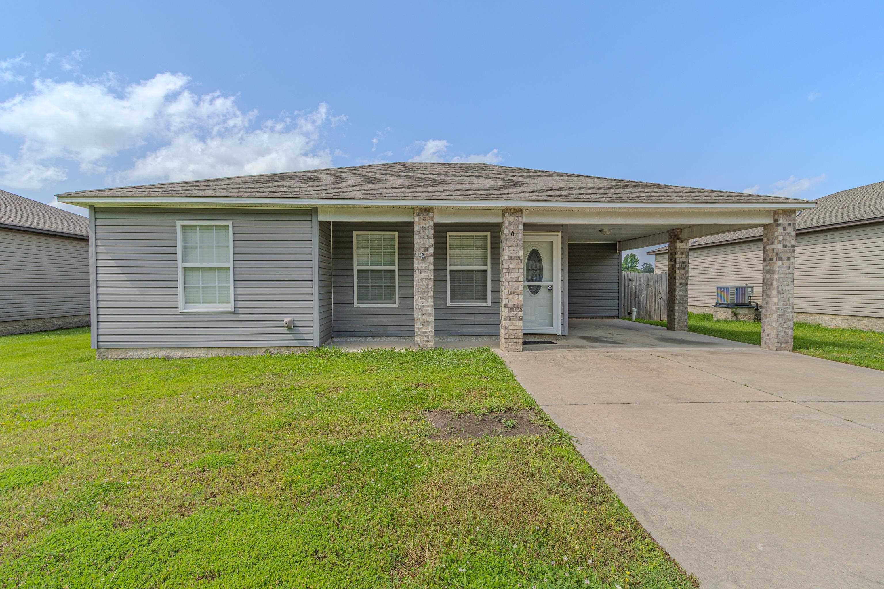 Welcome to this beautifully updated home in Ridgefield Estates of Paragould, AR! Inside, you’ll love the open floor plan filled with natural light, fresh new flooring, and crisp white cabinets that perfectly complement the sleek new granite countertops. The kitchen includes stainless steel appliances, making it both stylish and functional. The living area features a charming tray ceiling, adding a touch of character, while the updated bathroom boasts a luxurious walk-in tile shower. Step outside to enjoy the covered back porch and fully fenced backyard—perfect for relaxing or entertaining. This one is move-in ready and full of charm!