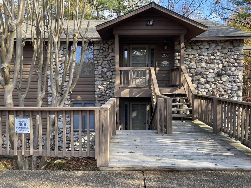 You don't want to miss this! If you have been looking for your very own weekend getaway or investment property at Mountain Harbor Resort on Lake Ouachita this is a must see. 2 bedrooms, 2 baths, approx. 1,416 sq ft, with the open concept living that makes gathering with family and friends so easy & fun. Full sized washer & dryer, wood burning fireplace, fully furnished AND the bonus room down below has been finished out as a 3rd bedroom with a full bath, microwave and fridge. Perfect for additional guests who want their privacy.  2023 upgrades include new kitchen appliances, new light fixtures throughout, TV's, mattresses and linens.  Located on a great street within walking distance to the new pickleball court. Whether you are looking for a weekend getaway, investment property or full time residence this condo delivers!  What are you waiting for?  Call today for your private showing.