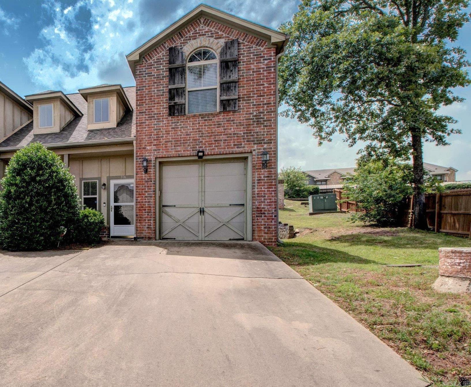 **AGENTS SEE REMARKS!** Precious, Move-in ready and beautifully maintained, this 2-bedroom, 2-bath end-unit townhome in the desirable Villas at Audubon offers 1,445 square feet of comfortable living. The main level features brand new luxury vinyl plank flooring, while the upstairs boasts like-new carpet in excellent condition. The updated flooring adds a modern touch and significantly brightens the space. The home and the ductwork has been professionally cleaned and sanitized for added peace of mind. The spacious kitchen includes granite countertops and a pantry, and there's convenient under-stair storage to maximize space. Enjoy cozy evenings by the fireplace this fall and take advantage of the community clubhouse, which features a pool for hot Arkansas summer days and enjoy exercising in the workout area. With a low POA of just $120/month, this home is a fantastic value. Don’t miss your chance to make this turnkey townhome yours!