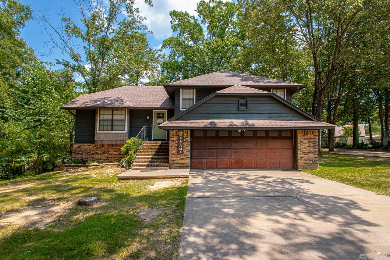 Welcome to this spacious 3-bedroom, 3-bathroom home nestled in the highly sought-after Dark Forest neighborhood. With two generous living areas, a versatile bonus room could be fourth bedroom, and even a hidden room for added charm or storage, this home offers room to grow and space to entertain. Situated on a large lot with mature trees, the outdoor possibilities are endless. Zoned for the highly rated Howard Perrin Elementary, this property is perfect for comfort, convenience, and character!