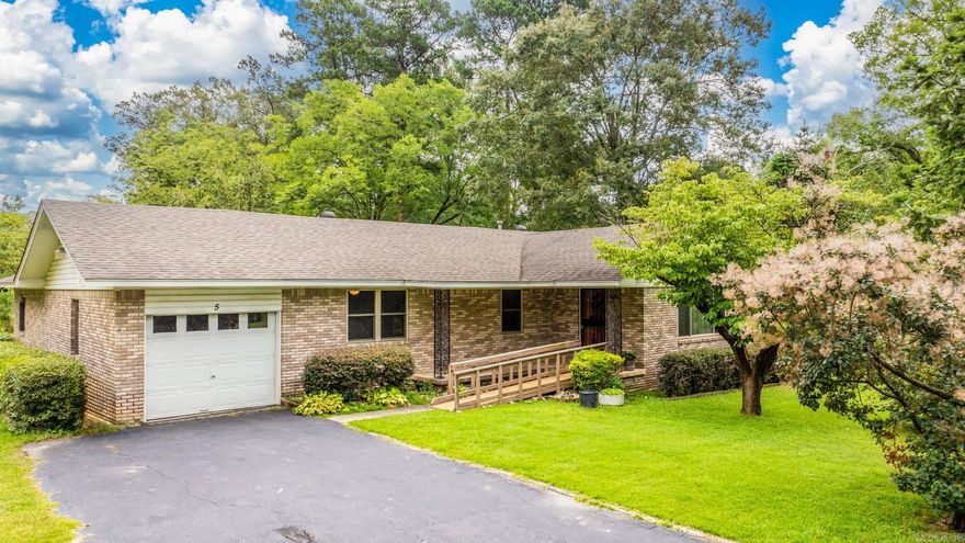 Great home with a second living room on a large lot and two sheds! Come and see if it's yours!