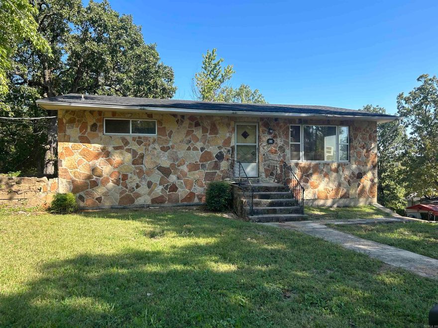 Investors, this is it! The perfect fixer upper home in the heart of Henderson, AR. Two bedroom, two bath home with an unfinished basement and 2 car garage. Get your tools out now so this beauty can really shine just in time for next year's lake season! Perfect getaway home or airbnb. Don't miss out on this opportunity!