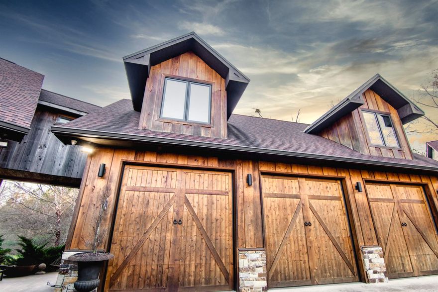 EXQUISITE WOOSTER ESTATE-IN-GROUND POOL & SPA & MASSIVE SHOP W/INQTRS! Builder/designer of this ONE-OF-A-KIND LUXURY holds nothing back by unique design & eloquent spaces! Through a gated entry lavished on 4.32 acres-striking cypress & stone custom, flanked by extraordinary exterior while its interior is breathtaking!! A luxury retreat, construction of this magnificent estate was created w/advanced engineering & highest quality of both local & imported materials! Eloquent spiral showcases Italian Cypress & Iron! DBL-sided wood burning fireplace surrounded by Arkansas Field Stone further connects formal & gourmet kitchen! High-end appliances incl side-by-side fridges, 48" cooktop/grill, DBL ovens/Monogram, Advantium oven, SS Farm sink DBL faucets & purifier. Spacious primary STE w/pool access! Hit the OASIS in-ground saltwater pool & beach! RELAX in the SPA offering peace & serenity!! New lodge incl KITCHEN, WALK-IN SHOWER, gorgeous hardwoods, SONOS, LG windows abound! Perfect for SECONDARY QTRS., GYM, OFFICE, MEGA SHOP! DBL. pass-thru H/C garages w/10x10 solid doors, security, bath! 2X6 frame w/foam! Shelter! Main 4600sf +/- BOASTING 6400! EXPERIENCE LUXURY & PEACEFULNESS!! WOW!!