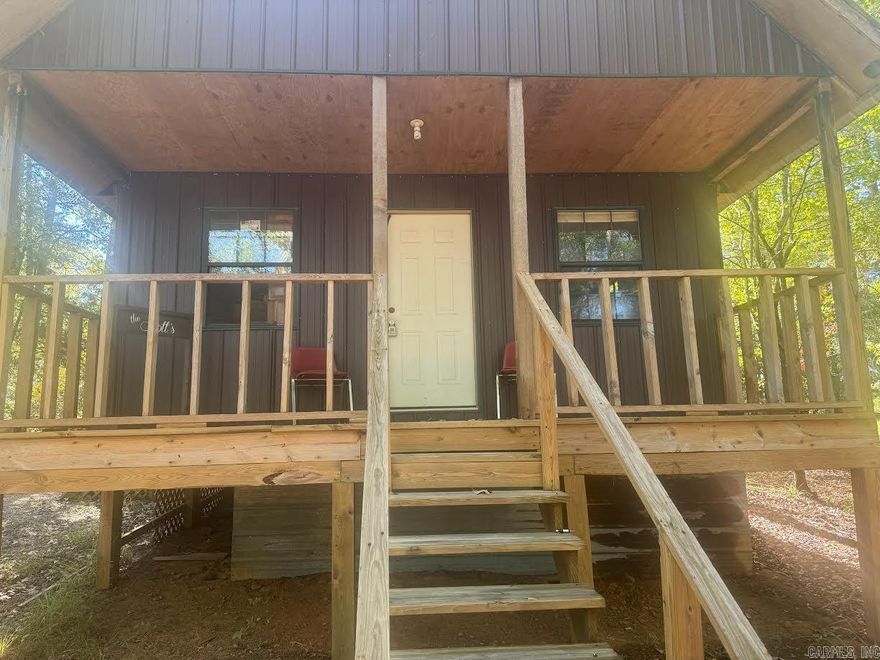 Great Cabin ON the Mountain Fork River!!  This property has River frontage and USE of the Common Area along the River!  Cute 2 Bedroom/1 Bath Cabin with Front Porch that has a view of the Mountain Fork River. The Cabin has had some updating done to it recently. This Property allows you to launch your canoe, Kayak, or just swim and Fish from the riverbank!  The property is very well situated to access both the west trail system and the east trail system.  These Mountain Fork River properties are very desirable and don't come along very often! Some Restrictions Apply. Owner Financing available WAC