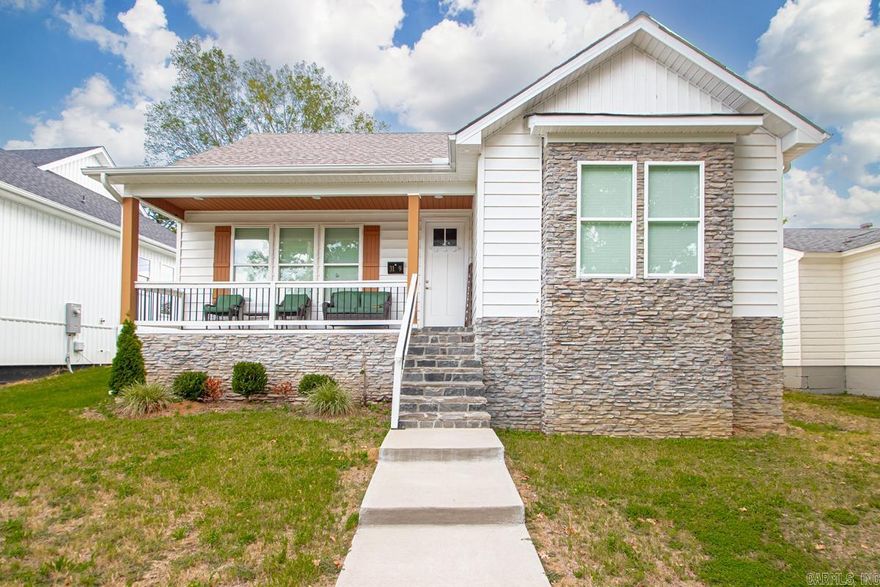Built in 2023, this stunning 3-bedroom, 2-bath home blends contemporary style with everyday comfort. Step inside and be greeted by an open-concept floor plan filled with natural light, soaring ceilings, and high-end finishes throughout. The spacious living room features a cozy fireplace and flows seamlessly into the dining area and designer kitchen, perfect for entertaining. The kitchen is a true showpiece with custom cabinetry, quartz countertops, stainless steel appliances, and a large amount of storage space. The primary suite offers a relaxing retreat with a spa-like en suite bath, while two additional bedrooms and a second full bath provide flexibility for family, guests, or a home office. Other features include open concept living with fireplace, designer accent wall and updated fixtures, and energy-efficient windows and recessed lighting! Located just minutes from downtown Little Rock, this home offers easy access to shopping, dining, schools, and parks—making it the perfect combination of style, convenience, and comfort. Don’t miss the opportunity to make this beautiful home yours!