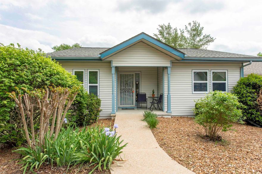 Turnkey one-level end-unit townhouse with strong Airbnb/short-term rental potential in Cherokee Village. Sold fully furnished—including hot tub, appliances, and furniture—this is a ready-to-go investment or low-maintenance full-time home.  Features include 2 bedrooms, 1.5 baths, eat-in kitchen, dining area, and spacious living room. Energy-efficient living with installed, paid-for solar panels—keeping electric bills extremely low. Newer roof around 2022. New exterior paint. Very well maintained by seller. Real estate taxes basically non existent for owner occupancy with the homestead credit of Arkansas.   Enjoy outdoor living on the covered, screened rear deck with a peaceful yard setting. End unit offers added privacy. Includes double carport and no yard maintenance.  Access to community amenities including 2 swimming pools (one indoor year-round), plus Cherokee Village’s 7 lakes, 2 golf courses, recreation centers, parks, and scenic walking trails in the Ozarks of Arkansas.  Shown by appointment—ideal for investors or second-home buyers.