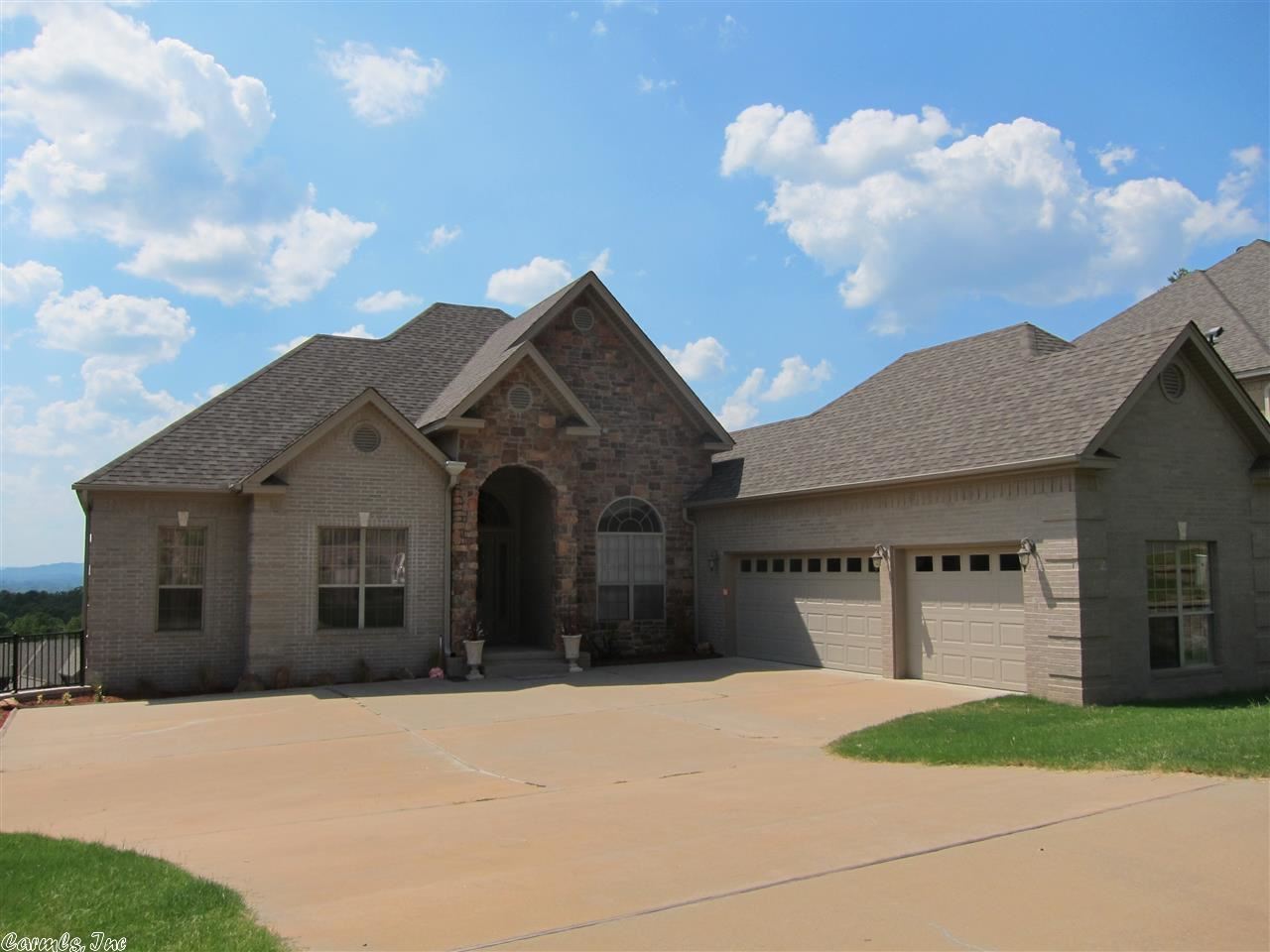 Breathtaking views from 3 different living areas!! Fabulous master suite& master bath w/ exquisite views! 2 huge walk in closets, sep his/ her marble vanities, 3 shower heads in marble shower. Stare at mountains while you shower!! Double sided fireplace from LR & huge hearth room. Amazing Kitchen w/ tons of cabinets & plenty of granite counter space. HUGE pantry. Alarm. 1,000 sq ft unfinished space. storm room. removable film on windows allows you to see views wout others seeing in. 3 car garage.