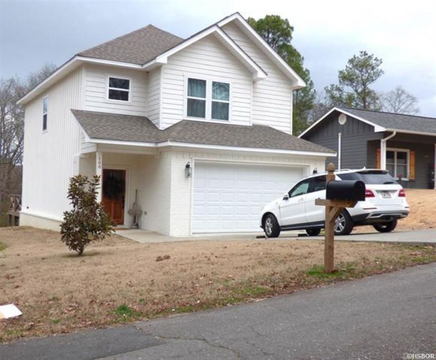 Adorable newly constructed single-family two-story home on two lots that combines modern comfort with convenience.  The double-height foyer flows to an open design among the first-floor kitchen with island, great room and dining area with direct access to the deck for seamless indoor-outdoor relaxation.  Upstairs caters to intimate spaces with 2 secondary bedrooms that share a Jack & Jill style bathroom.  The owner suite has trey ceiling detail while showcasing a private bath with double sinks and a large walk-in closet.  Situated only 2.9 miles to Lakeside School and 2.9 miles to downtown bath house row!  It also comes with a second lot that is waiting for your imagination to create whatever space you want or need.