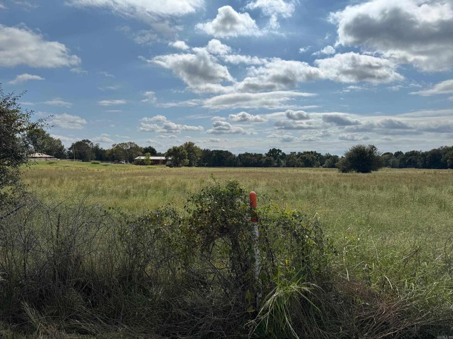 EXCELLENT COMMERCIAL OR RESIDENTIAL LOT ON HWY #64(MAIN ST) IN COAL HILL. BARELY WEST OF HWY #64 & HWY #164 INTERSECTION. ACROSS THE STREET FROM DOLLAR GENERAL STORE WITH FUEL PUMPS. SHORT DRIVE TO WESTSIDE SCHOOL. LAYS GREAT! IS NEARLY FLAT & IN HAY MEADOW QUALITY GRASS ALREADY. WOULD MAKE GREAT LOCATION FOR A RESTAURANT, ATTY-ACCOUNTANT OFFICE, CONSTRUCTION SHOP, & MORE! COULD EVEN BE A CUSTOM HOUSE SPOT. TWO MORE SIMILARLY PRICED ACRE LOTS AVAILABLE NEXT TO IT AND IF THE PRICE IS RIGHT EVEN MORE ACREAGE TO THE SOUTH.   ***SELLER WILL BE REMOVING THE FENCELINE AT THE HIGHWAY SOON AS POSSIBLE.