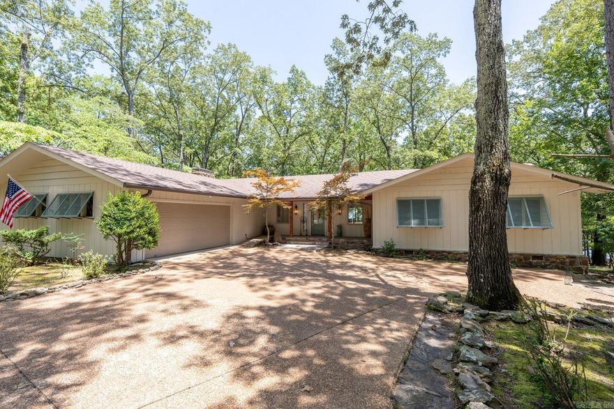 Lakefront home COMPLETELY UPDATE IN 2024!  4 bedrooms, 3 .5 baths, 2 living areas and almost completely furnished!  2-car garage and very close to Eden Isle Marina.  See photos!