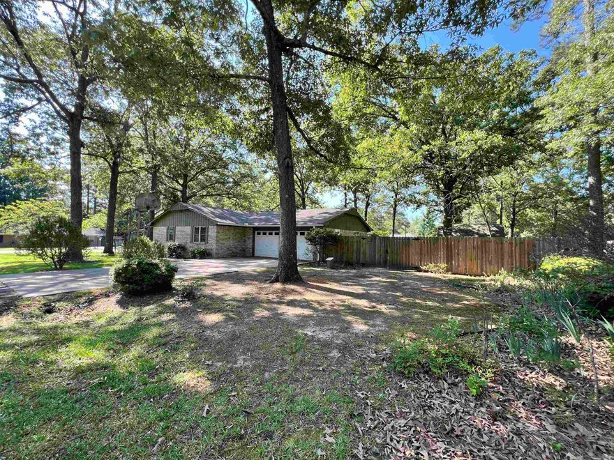 Completely updated and move-in ready, this inviting 3 bedroom, 2 bath home offers 1,812 sqft of comfortable living space with thoughtful upgrades throughout. Recent improvements include newer flooring, fresh interior paint, updated light fixtures with can lighting, new ceiling fans, and updated door hardware.  The kitchen has been beautifully refreshed with marble countertops, updated cabinet doors and hardware, a new sink and faucet, plus newer appliances including the stove and dishwasher. Both bathrooms have been extensively renovated with updated tile, lighting, toilets, and exhaust fans. The spacious primary bathroom features a stunning walk-in shower with beautiful navy blue tile accents.  Outside, enjoy the fenced backyard with a powered storage shed, a large open deck perfect for relaxing or entertaining, and mature landscaping that creates a peaceful outdoor setting. This home blends modern updates with warm, everyday comfort and is ready for its next owners to enjoy.
