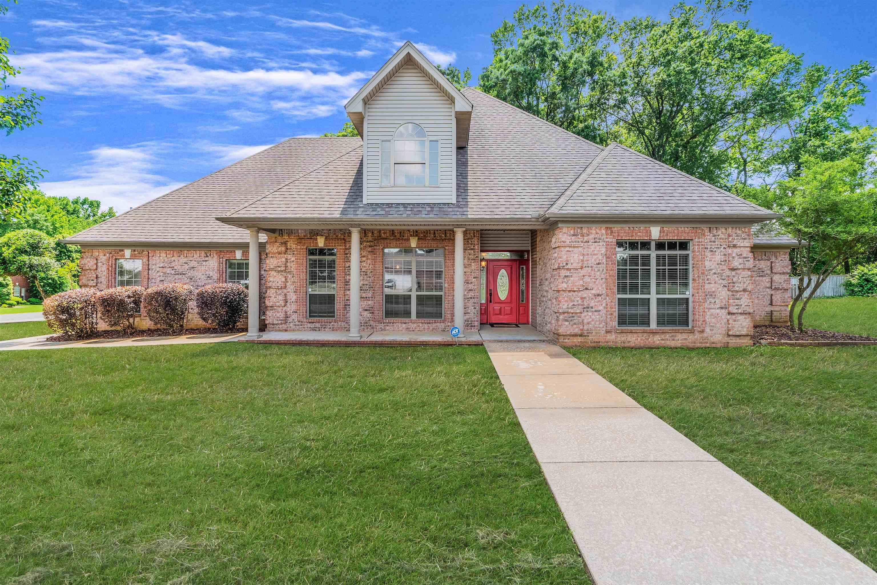 Nearly an acre on a corner lot in the peaceful and well-kept Royal Oak subdivision. This home features a well-designed layout with a spacious bonus room, a formal dining area with a high ceiling, and detailed trim throughout. Updated tile offers a modern, durable surface that's easy to maintain. Each of the three generously sized bedrooms includes its own full bathroom and walk-in closet. The primary suite also includes an adjoining room that's well-suited for a nursery, private office, reading nook, or project room, along with a walk-in safe room. Mature oak trees provide shade in part of the backyard, and the covered porch is a great spot to relax. A large attached three-car garage provides plenty of space for vehicles and storage. Designed with everyday living in mind, this home offers a rare blend of comfort, space, and lasting quality. Sellers will offer buyers a 1 year home warranty.