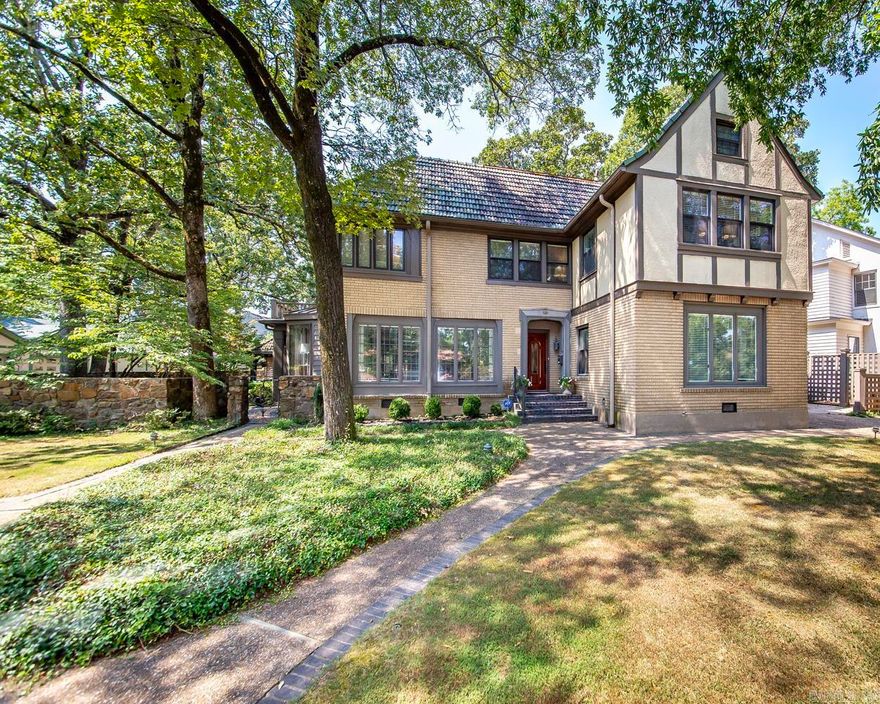 PROSPECT TERRACE / Heights - Stunning 4 bedroom, 4.5 bathroom home nestled in the highly sought-after Prospect Terrace subdivision of the Heights neighborhood of Little Rock, Arkansas. This beautiful property sits on a lot and a half and offers multiple areas for entertaining, including a formal living room, formal dining room, den, and playroom. The backyard, designed by the renowned P. Allen Smith, is a true oasis with its English garden-style landscaping and tranquil atmosphere. Enjoy the outdoors year-round on the large screened-in porch. With a guest suite on the main level, this home provides ample space for visitors or extended family members. Don't miss out on this incredible opportunity - schedule your showing today and envision yourself calling this stunning property home sweet home! Agents, please see the remarks