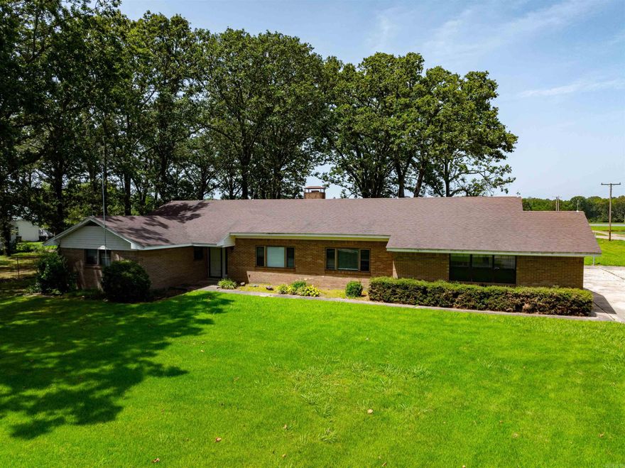 Welcome to your dream home! This stunning three-bedroom, three-bathroom brick house is fully updated and move-in ready. It features a nice office that the sellers also used as a bedroom; however, it technically remains an office due to the absence of a window. Featuring gorgeous flooring throughout, each bathroom boasts custom-tiled walk-in showers, with one offering a combined tub and shower for added convenience. The spacious kitchen is a chef's delight, with a custom tile backsplash and an open layout that seamlessly connects to the dining and living areas, perfect for entertaining family and friends.This home is ideal for a growing family, offering plenty of space and modern amenities. All bedrooms are thoughtfully located on one side of the house, ensuring privacy and tranquility. The large laundry room and an additional bathroom.It would make an excellent hunting lodge for outdoor enthusiasts. Located in the heart of public lands, this property is just 20 miles from prime hunting grounds, including Dagmar WMA, Cache River National Wildlife Refuge, Wattensaw WMA, Benson Creek Natural Area, and the White River, with over 100,000 acres of diverse and abundant wildlife habitats.