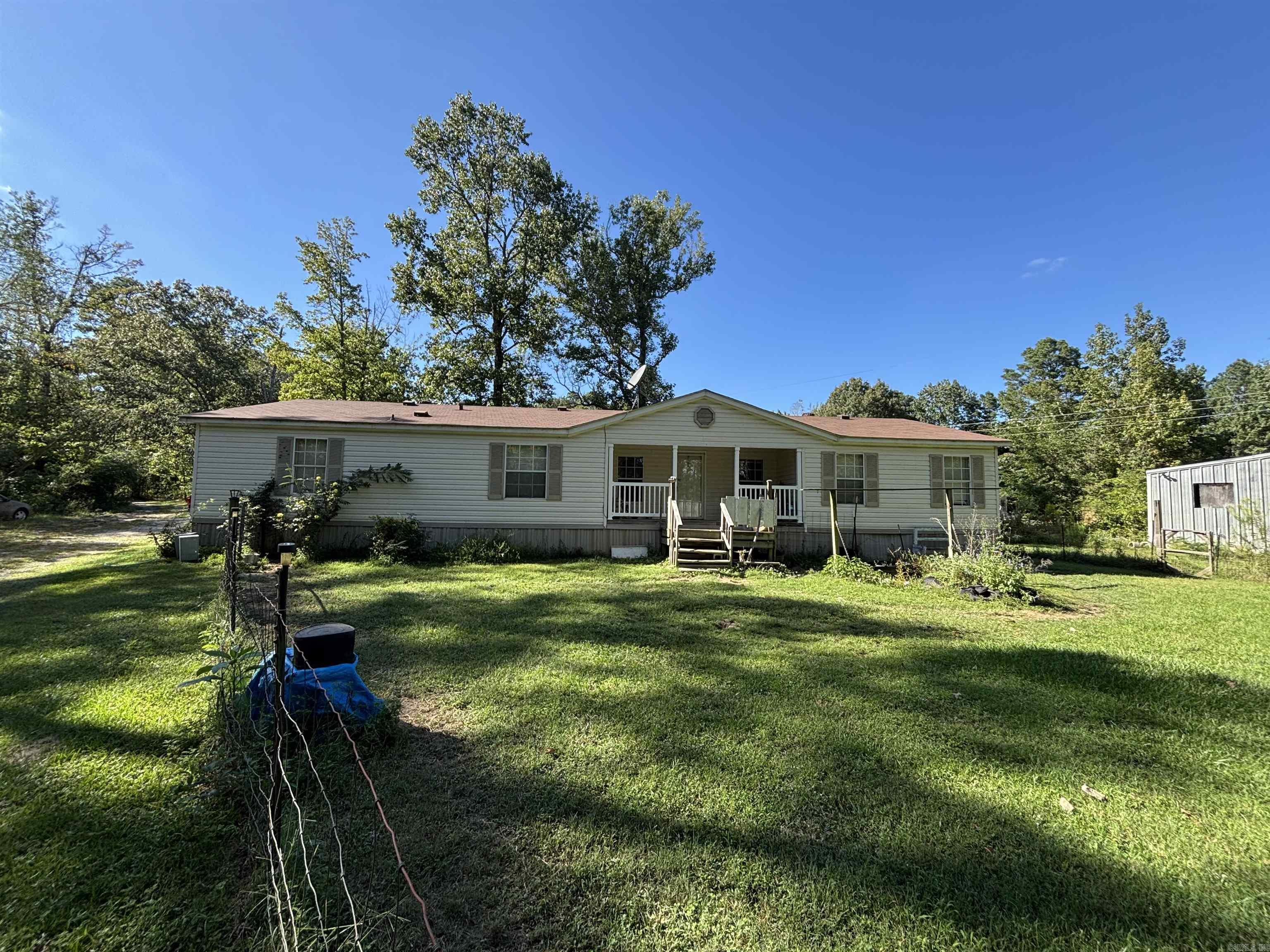 Excellent investment opportunity. Listing includes three 3 Bedroom/2 Bath properties as follows: 14130 is 1,848 sqft, built in 2005 with a wood burning fireplace. 14134 is 1,680 sqft, built in 1996 with a wood burning fireplace. 14136 is 1,536 sqft, built in 2014 and is handicap accessible. Also included on the property is a 38x50 storage building wired for 110v and 220v, a storm shelter, and 14132 is 1,176 sqft built in 1971 could possibly be rehabbed and turned into a fourth house. All of this is located on 4.99 acres with room for additional properties or just enjoying county living just outside of town.