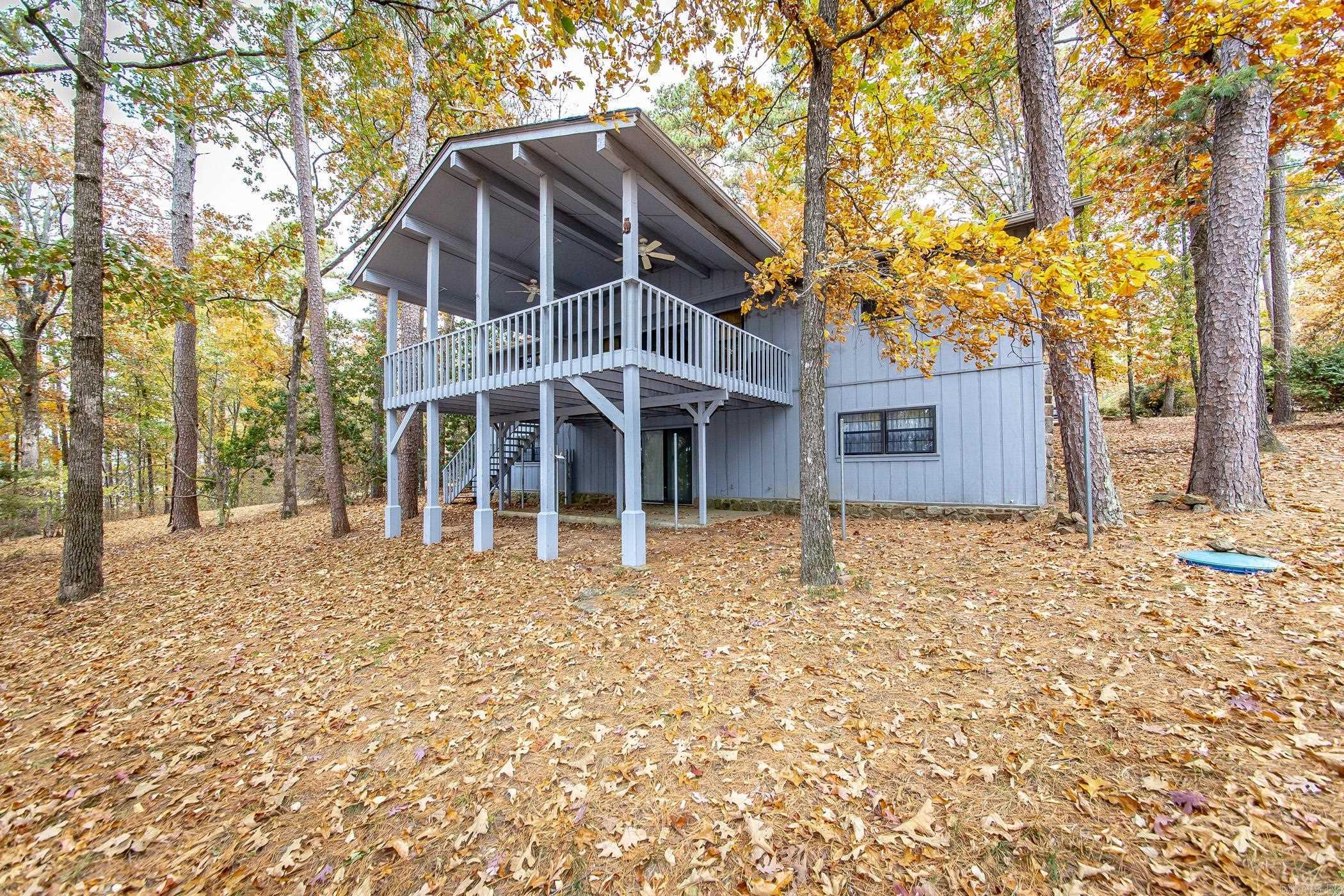 LAKEFRONT HOME IN MYSTIC ISLE SUBDIVISION! This 3-bedroom home has everything for full-time or part-time living and entertaining on Greers Ferry Lake with easy walk to water! With 165ft of lake frontage, a sandy beach and perfect swimming hole awaits you for a fun-filled day at the lake and prime time fishing! Find your happy place at the mouth of Middle Fork!!