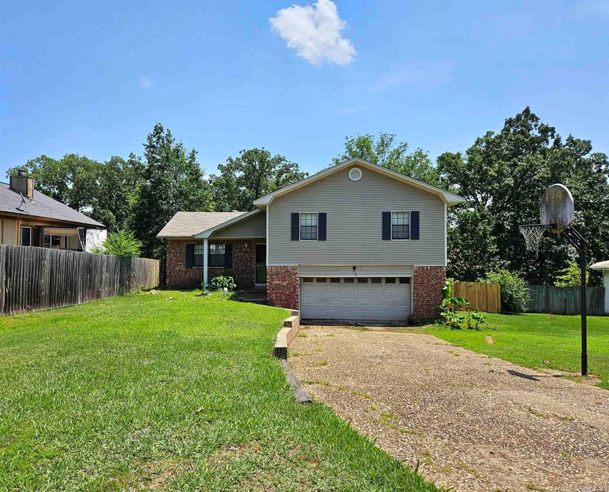 A rare gem awaits in the desirable Piney Cove Addition of Maumelle. This split-level residence boasts all the features you desire. With just a modest investment, you can transform this fixer upper into the home of your dreams. Step into your own piece of Maumelle with a beautifully fenced backyard, providing privacy and comfort. Situated in a tranquil cul-de-sac, this property offers a serene living environment. With 3 spacious bedrooms, it provides ample space for living separation and utilization. Not only does this home offer great aesthetics, but it also comes with recent upgrades. A new roof and dishwasher were installed in 2021, followed by a new HVAC system in 2022, taking care of some big-ticket worries. This highly sought-after property in Maumelle presents a remarkable investment opportunity. Take advantage of this chance to own a piece of real estate in Maumelle and create lasting memories in this wonderful community.