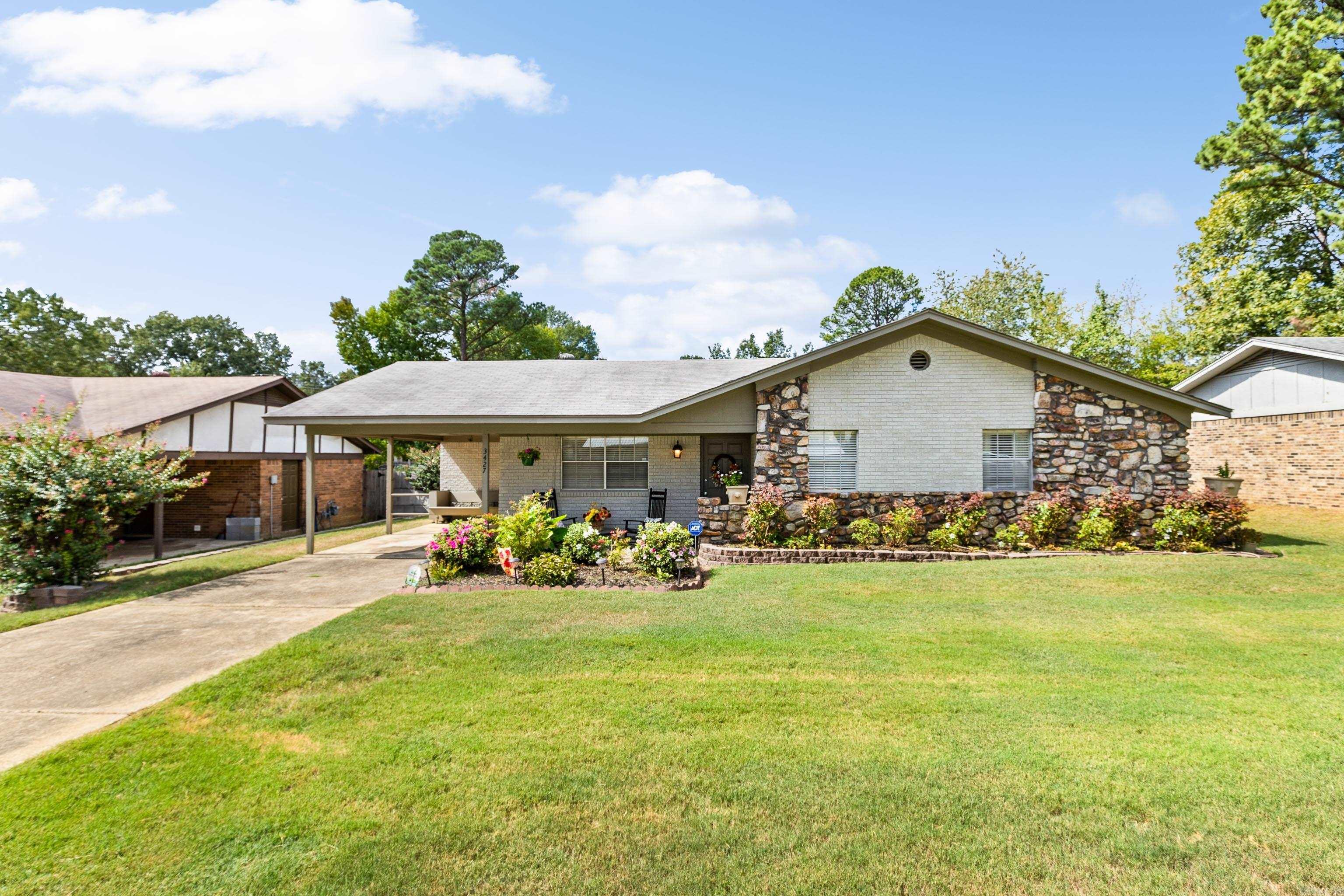 Check out this charming 3-bedroom, 2-bath home in Bryant! This fully updated property features an open floor plan, fresh exterior paint job and a delightful sunroom for relaxation. Enjoy a large, fenced in backyard perfect for outdoor activities! Bryant schools! This home is truly MOVE-IN ready!