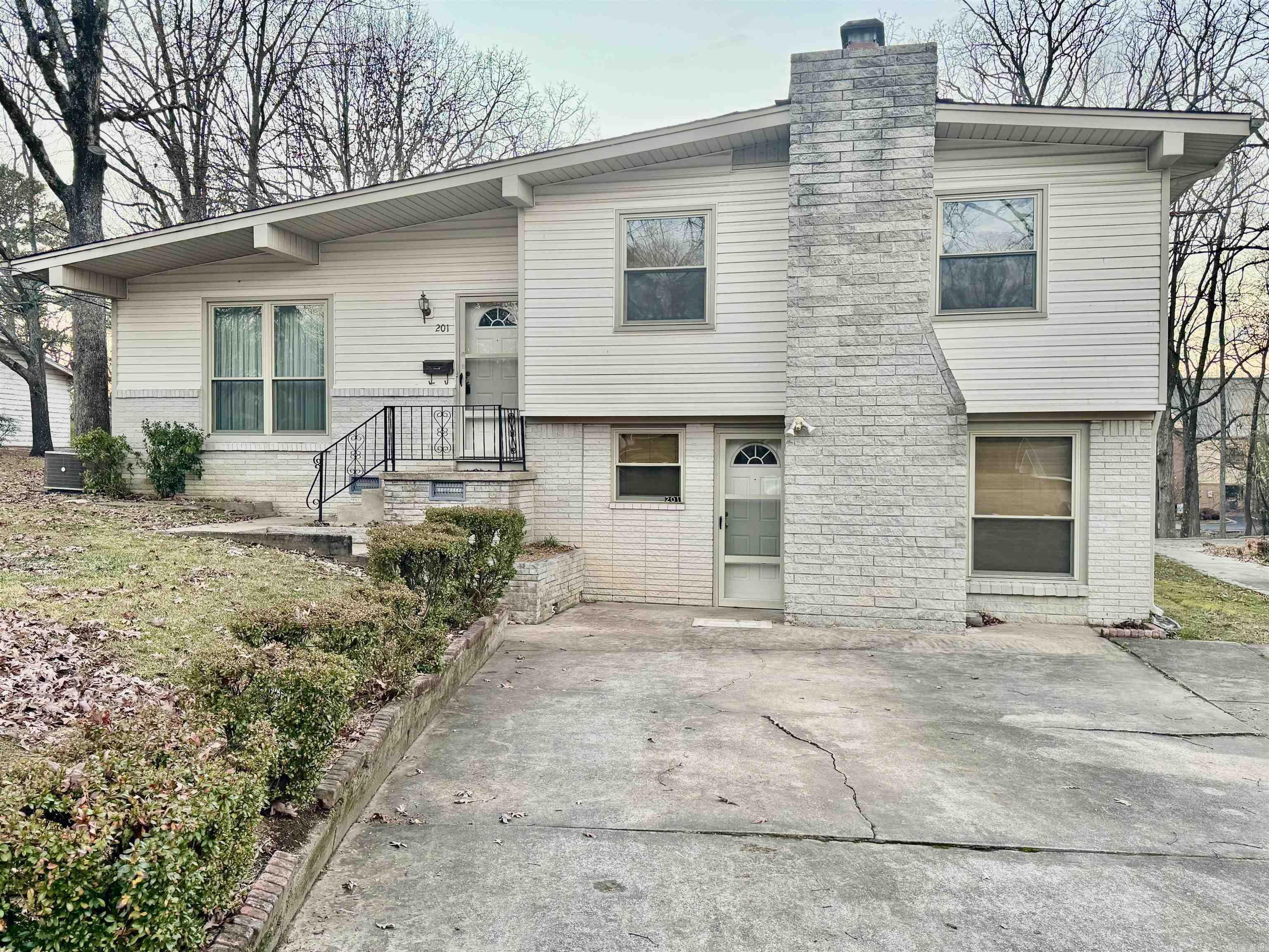 Discover the potential of this charming 3bd 2ba home. Great location for a starter home or investment opportunity. Theres a huge downstairs area that could be used as a bedroom or play room with a gas log fireplace. Hot water tank replaced 2019. Roof is about 9 years old, The tax records doesn't include the entire downstairs. No property disclosure will be provided. 16x10 Storage building that conveys. This home is a must see.
