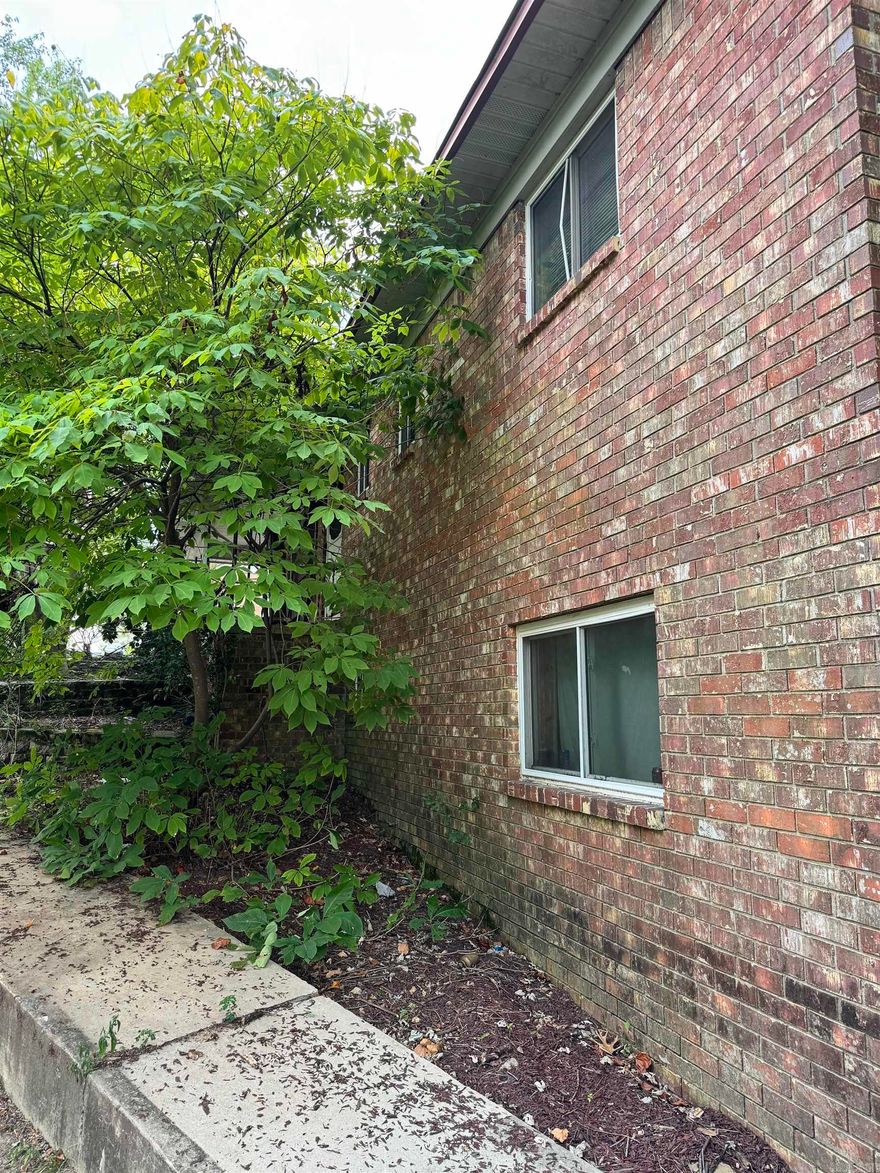 With a little bit of love and imagination, this all-brick home could be your dream come true! Perfect for first-time homebuyers, DIY enthusiasts, or investors looking for a new project.    New Roof, add on Den, 36 x 26 Shop in back yard as well as 20 x 12 storage building.  ARV $330,000  Conventional loan or Cash only.