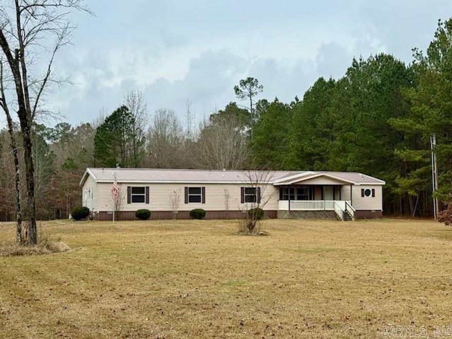 Come see this great 4 bed 3 bath, right outside the city limits. 2 hobby/craft storage buildings, 30x40 drive in shop with utilities, RV hook ups, huge back porch, all on 3.75 acres of land.