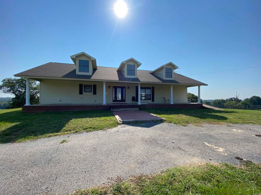 Country living with approx 36 acres, stocked pond, fenced for cattle and a 60x60 hay barn.  Property has a large home with over 3,700 sq ft of living space, home is in the middle of a remodel with work to be done.  The main floor offers a large living room, spacious kitchen with bar and dining area, half bath and bonus room.  The downstairs could be 2 or 3 additional bedrooms with a jack-n-jill bath.  The downstairs has material to complete some of the work.  Walk out to a large concrete patio, in ground pool and gazabo.  Separate studio/shop with approx 425 sq ft of living space and a detached 24x26 carport.  Contact our office for more details or to schedule a viewing.