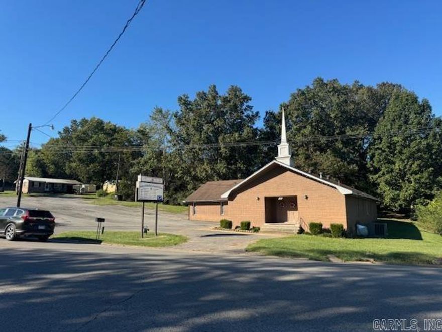Excellent investment opportunity! This property boasts a 3256sqft building currently leased as a church with asphalt parking lot and additional land. The additional land is currently zoned R1 and is a great opportunity for expansion or residential development! Church building is currently rented for $800/month