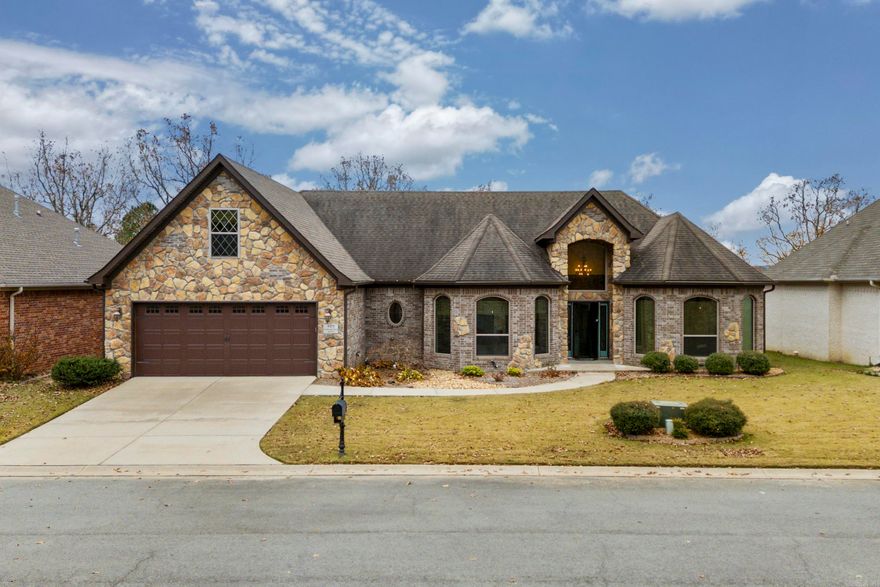 Awesome custom built brick home with stone accents. Beautiful Luxury Vinyl Plank has just been added throughout the entire downstairs.  Loaded with energy efficient features. Geothermal HVAC with 3 zones, radiant roof barrier decking, solar panels, 2 Rheem Marathon 50 gallon water heaters. The solar panels are paid for and will convey at no additional cost. You will love the kitchen! Quartz countertops with a hammered copper sink. Induction cooktop with a double convection oven. Pantry cabinet loaded with roll out shelves. Stainless Steel French door fridge will stay. Nice desk space off kitchen area. Master Bath features twin sinks with hammered copper bowls, huge tile shower, soaker tub plus a large walk in closet. One bedroom walkin closet doubles as a safe room. Big covered patio with a great view of a wooded space behind the house. No neighbors behind you except for the wildlife. Back yard is completely fenced with black metal fencing. Weekly lawn care is part of the $100 monthly POA dues. Sprinkler system to keep your lawn looking great! There is a floorplan in associated documents.