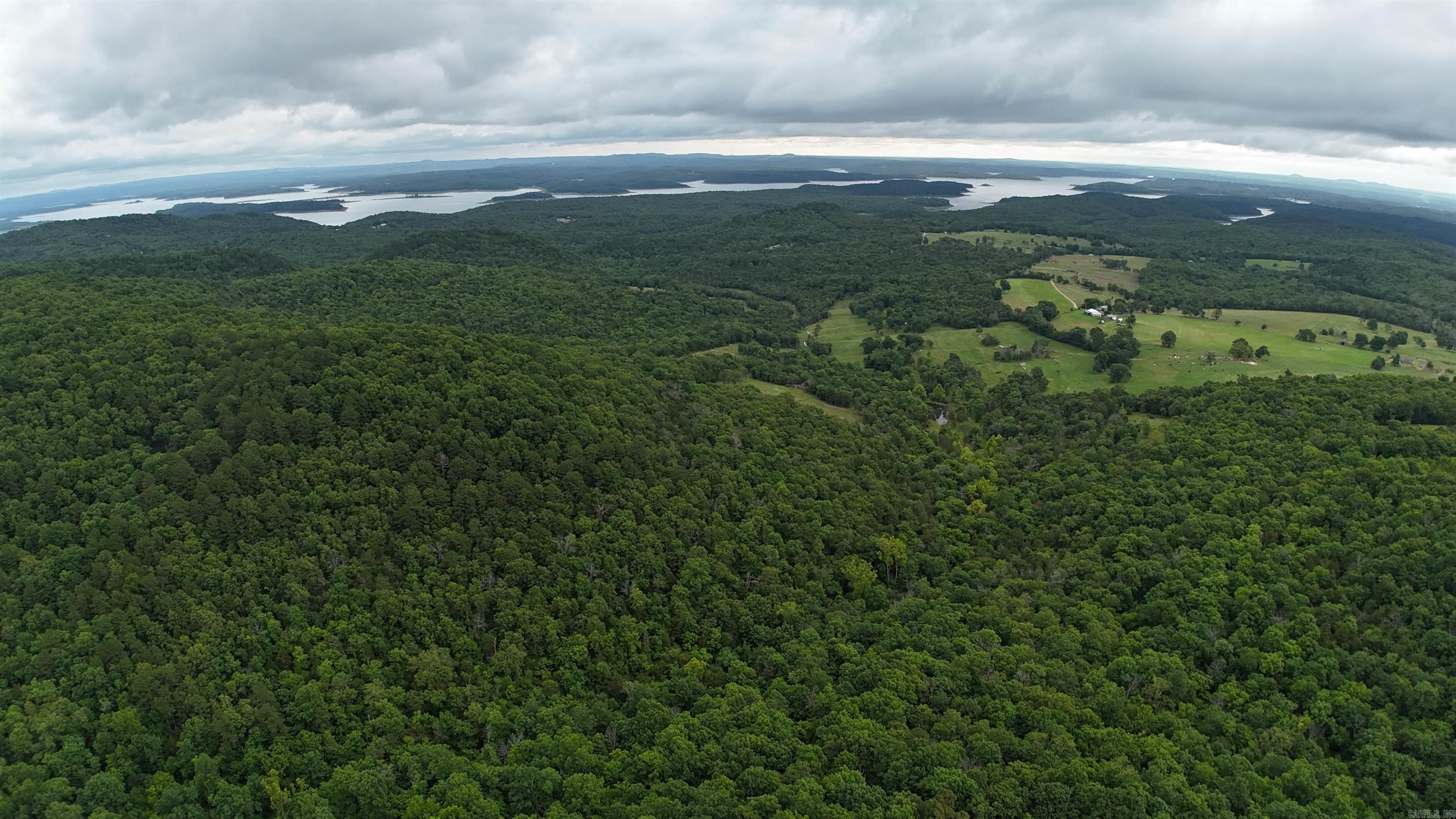 Three lots totaling 9.30 acres with views of the Bull Shoals Lake in the country. Build your dream home and enjoy the privacy and view. One-half mineral rights reserved.