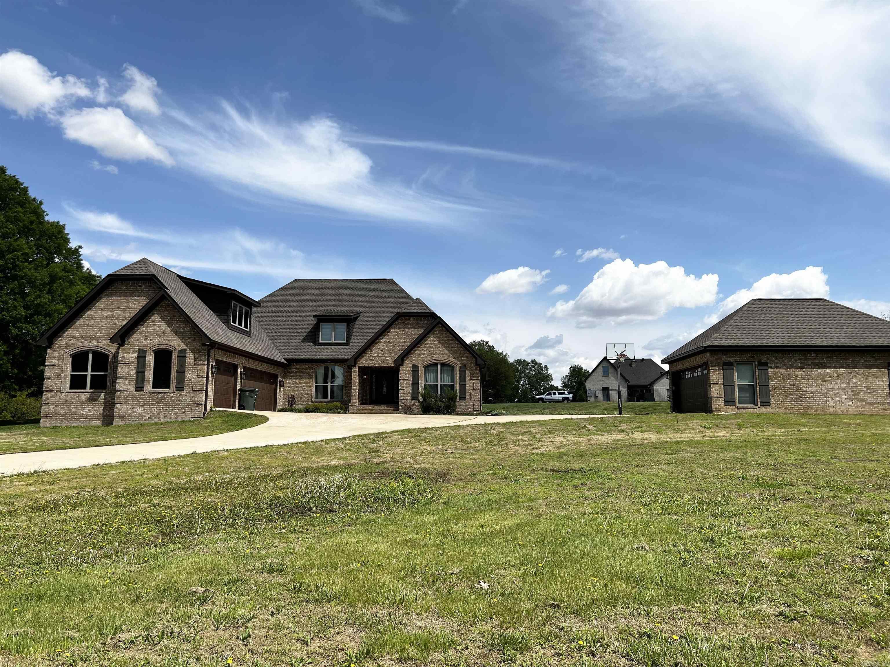 This 3 bedroom, 2 full bathroom home has 2,817 Sqft and sits on 2.3 +/- Acres. Offering a split floor plan with the spare bedrooms sharing jack & jill bathrooms, The master bedroom has a large walk-in shower, walk-in closet and soaker tub. There are also 2 half bathrooms,a safe room, and a large bonus room upstairs that could be used as a 4th bedroom or office. Don't forget the screened in patio and heated and cooled shop (20x30). Call today to set a showing.