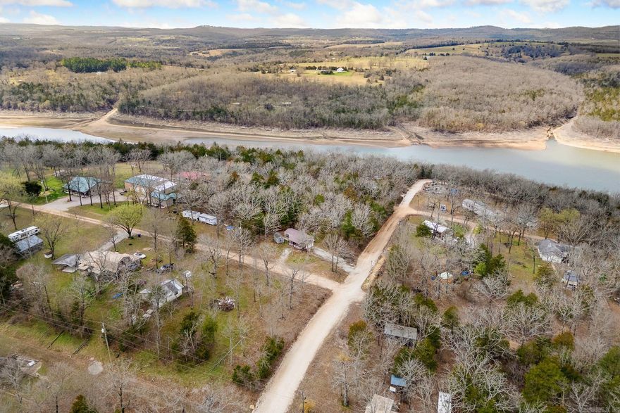 Escape to the lake with this cozy 1 bedroom, 1 bathroom retreat located just minutes from beautiful Bull Shoals Lake. Whether you're looking for the perfect fishing getaway, weekend escape, or a potential short-term rental investment, this property offers the ideal setting. Enjoy the peaceful surroundings, easy access to some of the best fishing in the region, and a low-maintenance space designed for relaxing after a day on the water. With its proximity to the lake and recreational opportunities, this property is a great opportunity for lake lovers and investors alike.