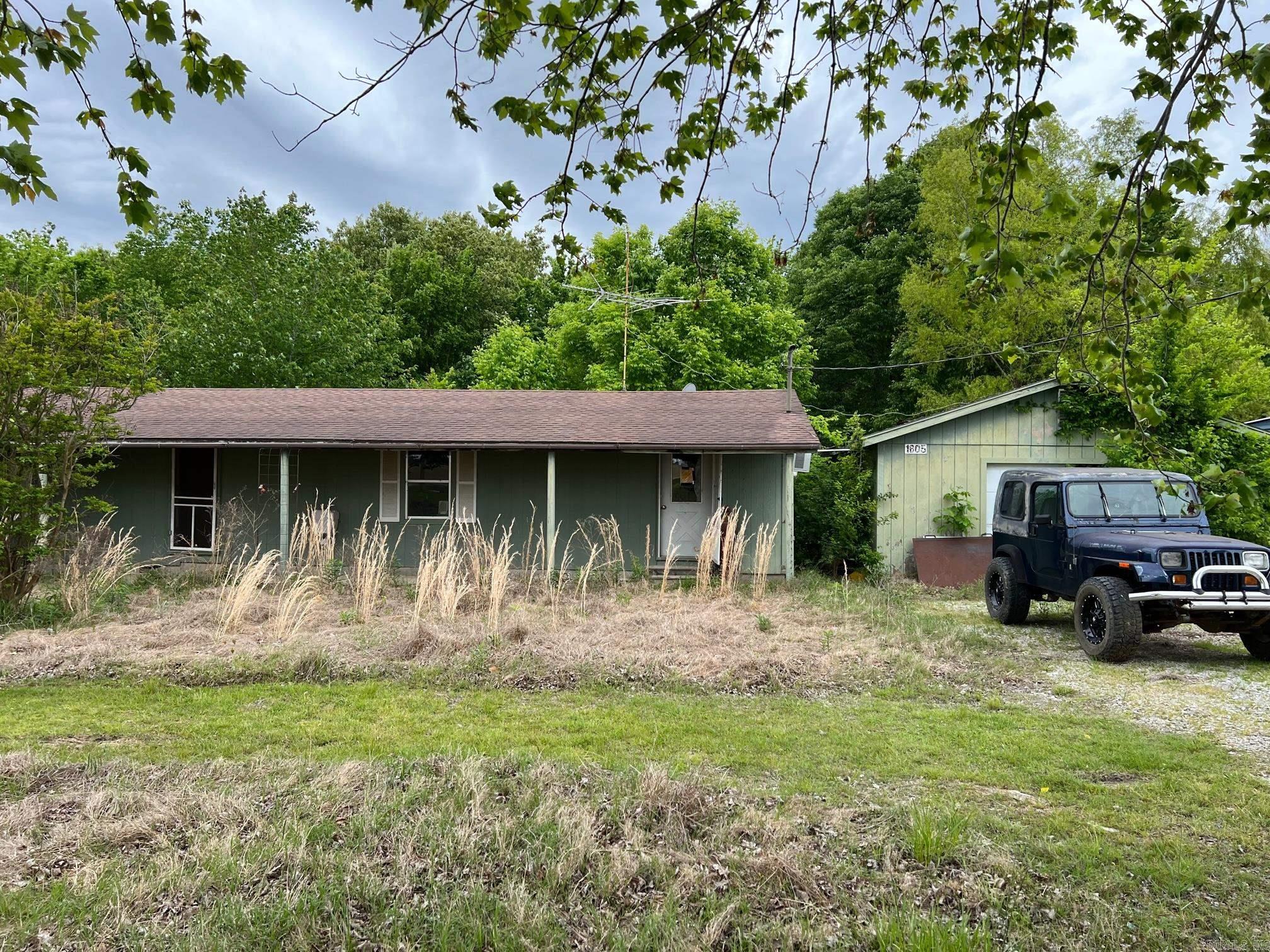 Floors in house have fallen out. All subfloors need replaced down. Floor Joist have given way. Shop roof is bad. House need floors and shop needs roof .48 acres