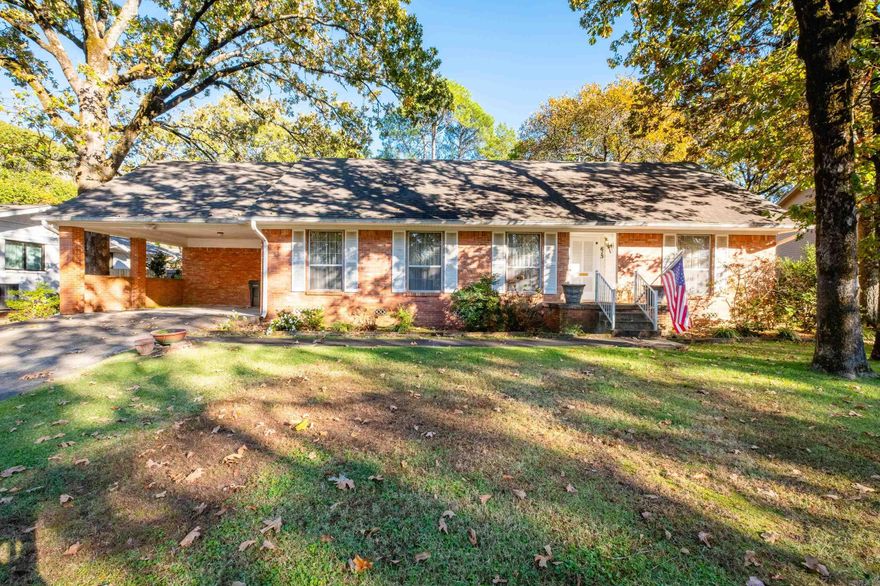 Charming traditional in Midtown.  Discover timeless design and modern functionality in this home, nestled in the heart of Midtown. Thoughtfully designed spaces include Formal Living and Dining Rooms: Perfect for hosting and entertaining. Family Room & Breakfast Nook -a cozy retreat for everyday living and casual meals. Large Laundry/Utility Room - features a built-in desk, ideal for organization or a small home workspace. Primary Suite- includes a walk-in shower, spacious walk-in closet, and serene privacy. Unfinished Attic -with staircase access offers storage, a home studio, or an additional living space. Ample Storage- generous closet space throughout the home ensures every item has its place. The large backyard is a true highlight, complete with a patio for outdoor gatherings and a convenient storage closet for tools or hobbies.