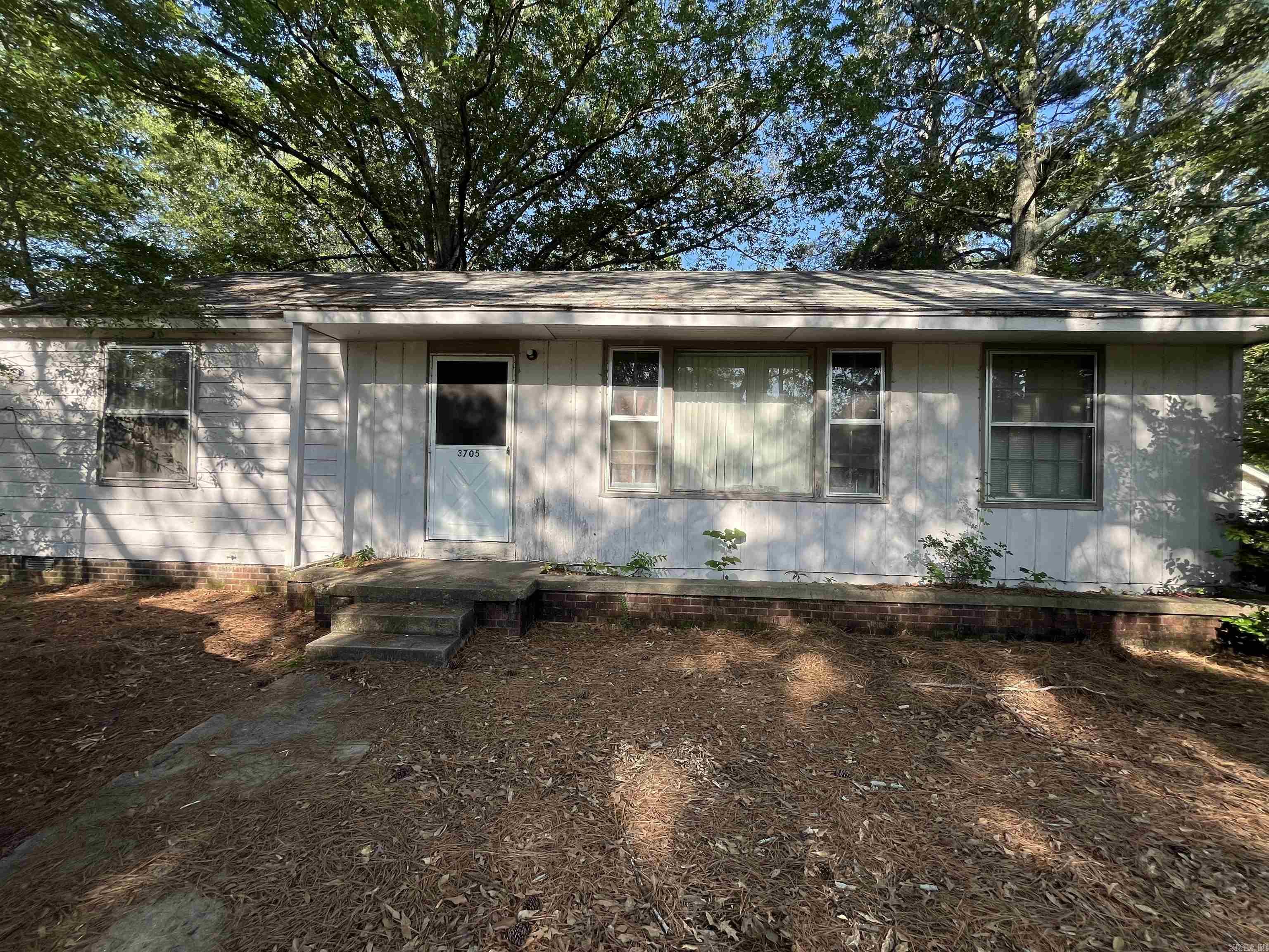 Three-bedroom room home on a large corner lot facing popular city street. To be sold as is where is. Just waiting for your personal touches!
