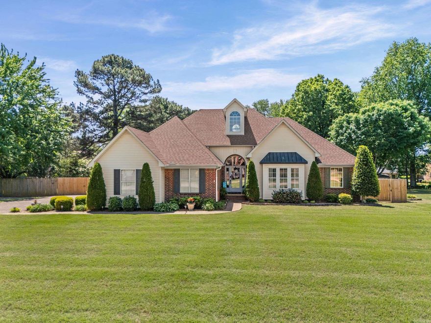 Welcome into this charming 4-bedroom, 3-bath home, featuring an inviting entry that opens to a spacious living room with 12-foot ceilings and a cozy wood-burning fireplace with a gas starter, perfect for making lasting memories. The updated kitchen offers a breakfast area along with a separate formal dining room, ideal for family gatherings and entertaining. The large primary suite includes a comfortable sitting area and an ensuite bathroom with double vanities and a walk-in shower. The guest bathroom also features double vanities along with a soaking tub and shower combination. The versatile 4th bedroom includes its own full bathroom and could easily serve as a game room, guest suite, or home office. Step outside to enjoy the oversized covered deck, perfect for relaxing, along with an additional patio area designed for entertaining. Additional features include a two-car garage, a floored attic for extra storage, a tankless water heater, a newer roof, and an HVAC system installed in 2016.  Conveniently located near the Searcy Country Club, where you can enjoy golf, swimming, tennis, pickleball, and dining—adding even more to this home’s appeal. Agents, please see remarks.
