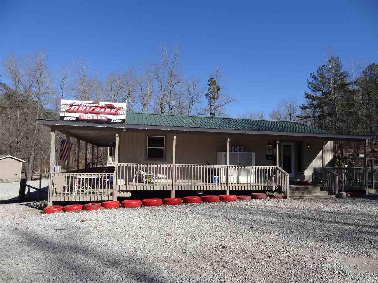 Offered for sale is the Hot Springs Off Road Vehicle Park. Visit their website:http://www.orvpark.com/ Long standing manager on site. Many structures on the property: managers home, office with merchandise, 4 cabins for rental, large pavilion for hosting events, and a storage shed. Business is growing each year and stays buys year-round. Various trail systems ranging from the kids area to terrain requiring specialty rock crawlers. Great timber, many creeks, and great views.