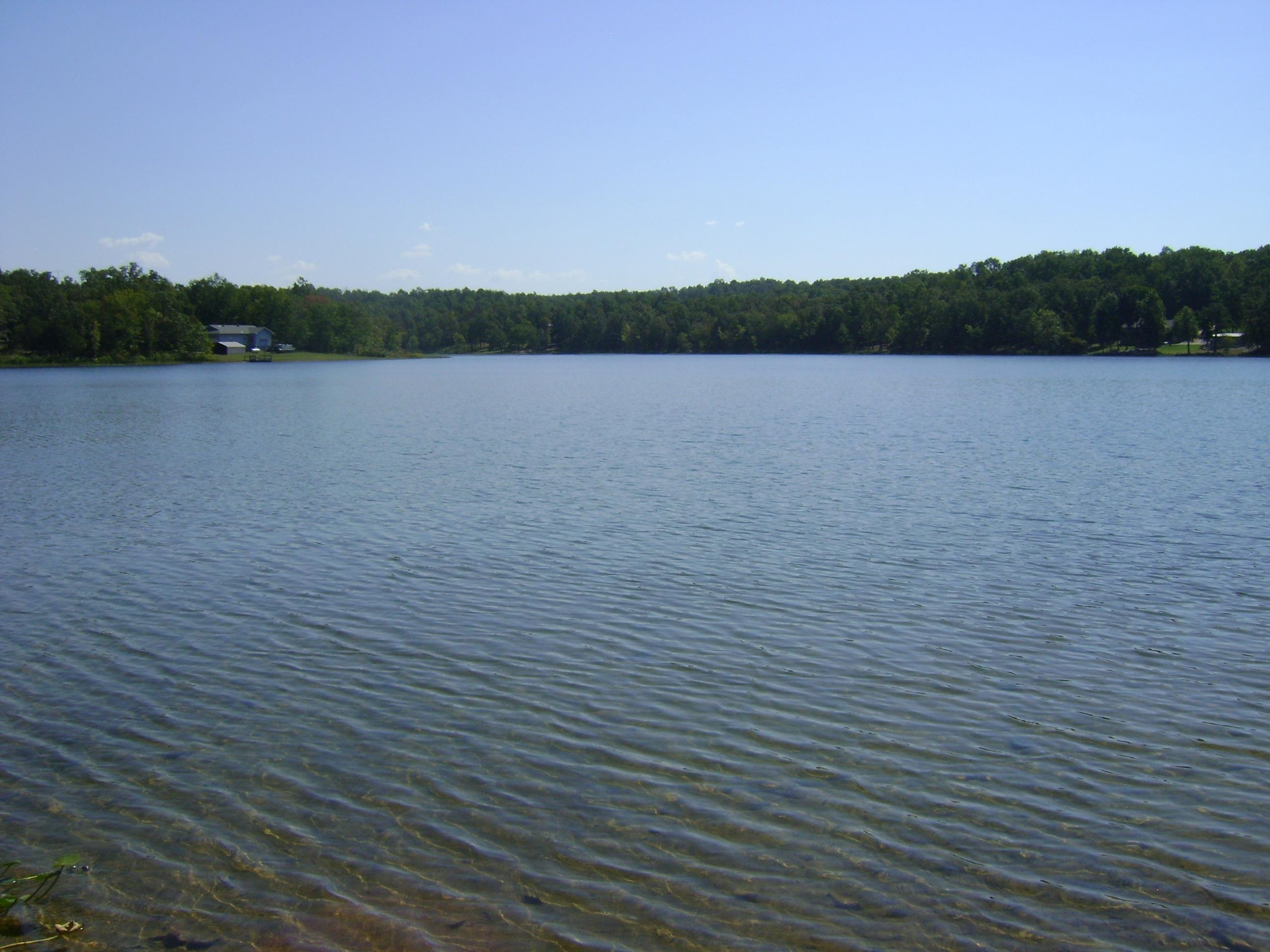 Two lots that connect with one located on the beautiful Crown Lake. It has 640 acres to enjoy, ski, tube, fish or just sit and enjoy the tranquility on your pontoon or dock. If you are looking for some place to build your dream home you have come to the right place then. Horseshoe Bend is the place for you where you can enjoy our Turkey Mountain golf Course is a 18-hole championship course, driving range, and pro shop. We also have other golf courses, rivers and lakes in the area to enjoy. Come take a look to day.