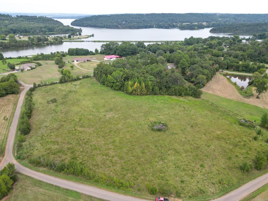 Discover the perfect canvas for your dream home or investment opportunity with this stunning 9-acre parcel of partially cleared land, ideally situated just moments away from the serene shores of Lake Dardanelle. This scenic property boasts a blend of natural beauty and accessibility, making it a prime location for those seeking tranquility and outdoor adventures.