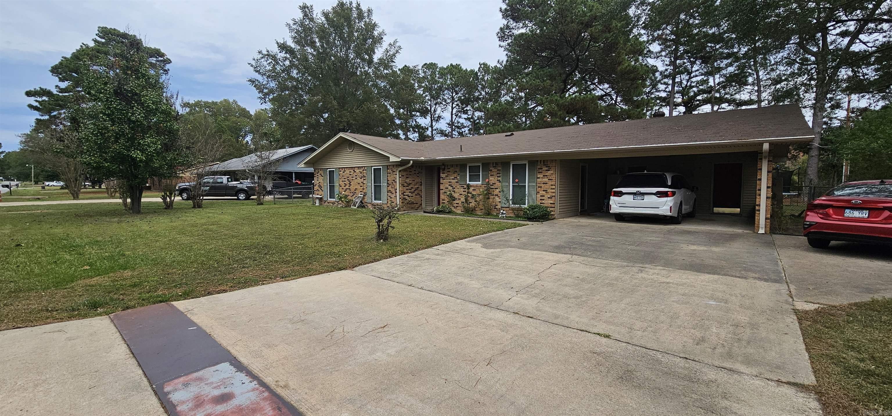 Family home!  This 3 bed, 2 bath home is ready to live!  Spacious living room, with new flooring throughout! Home also has energy-efficient windows installed in 2021.  Roof installed in 2020, and indoor heat/air unit replaced in 2024.  Back yard is fenced in and has a covered patio!