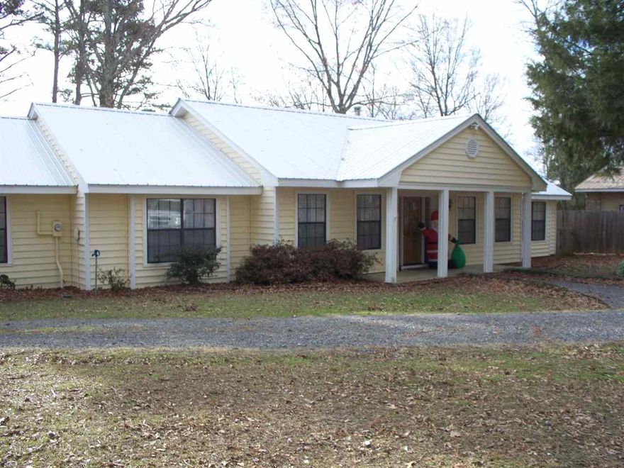 Beautiful 3 BR home overlooking Greers Ferry Lake.  Bluff View of the lake although the home is lakefront but high.  Need a 4 wheeler to get to water.  Panoramic View with breathtaking sunsets.  Home features an open living/kitchen area with an eat-in island.  Spacious dining room opens to the living area.  Large office area off kitchen and spacious 2 car garage.  Master suite features a private balcony and a 4 piece en suite with jetted tub.  Guest bath is 4 piece and two large guest bedrooms. Launch near.